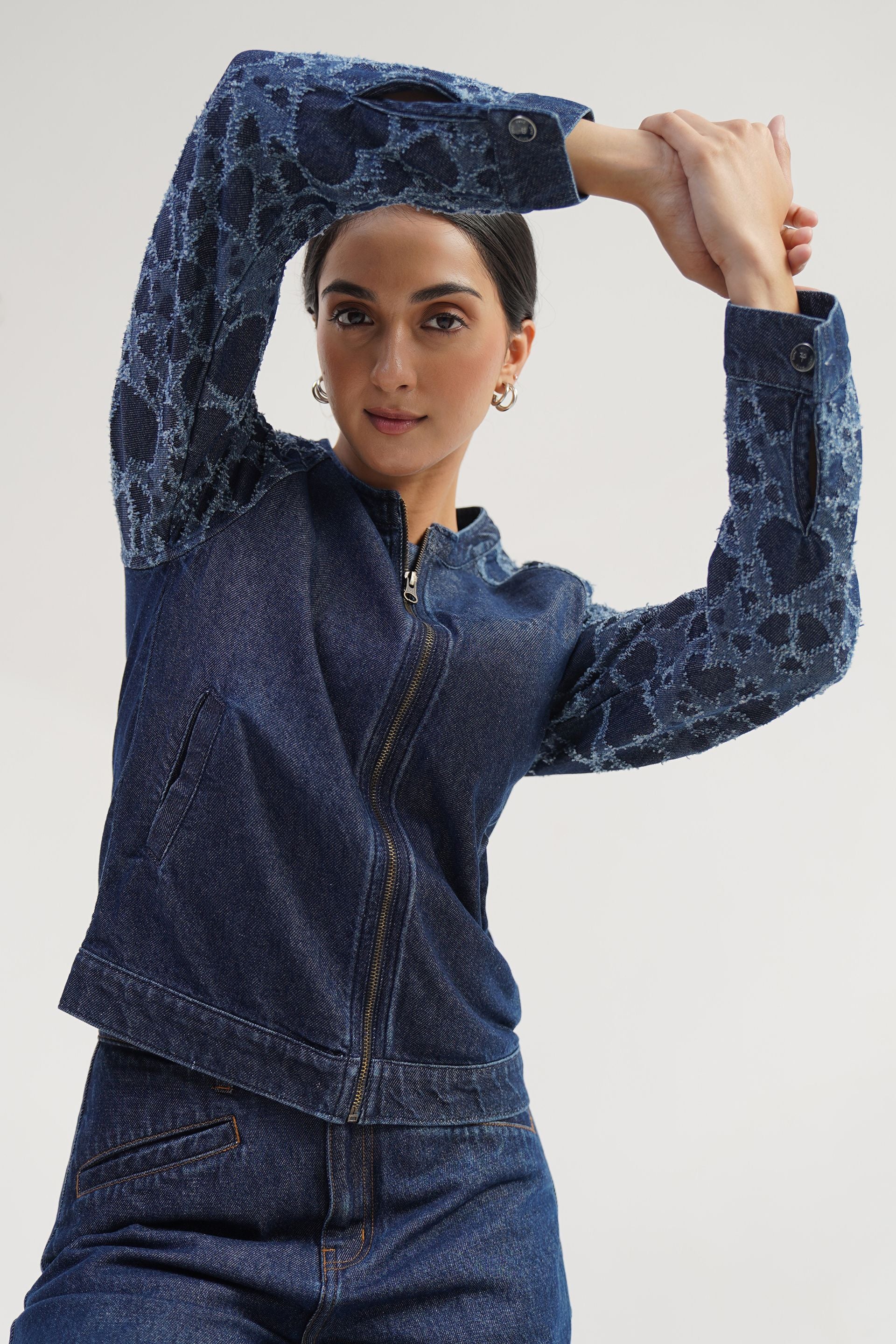 Women's oversized black denim jacket, 100% cotton, distressed with light wash, cropped style for ladies.