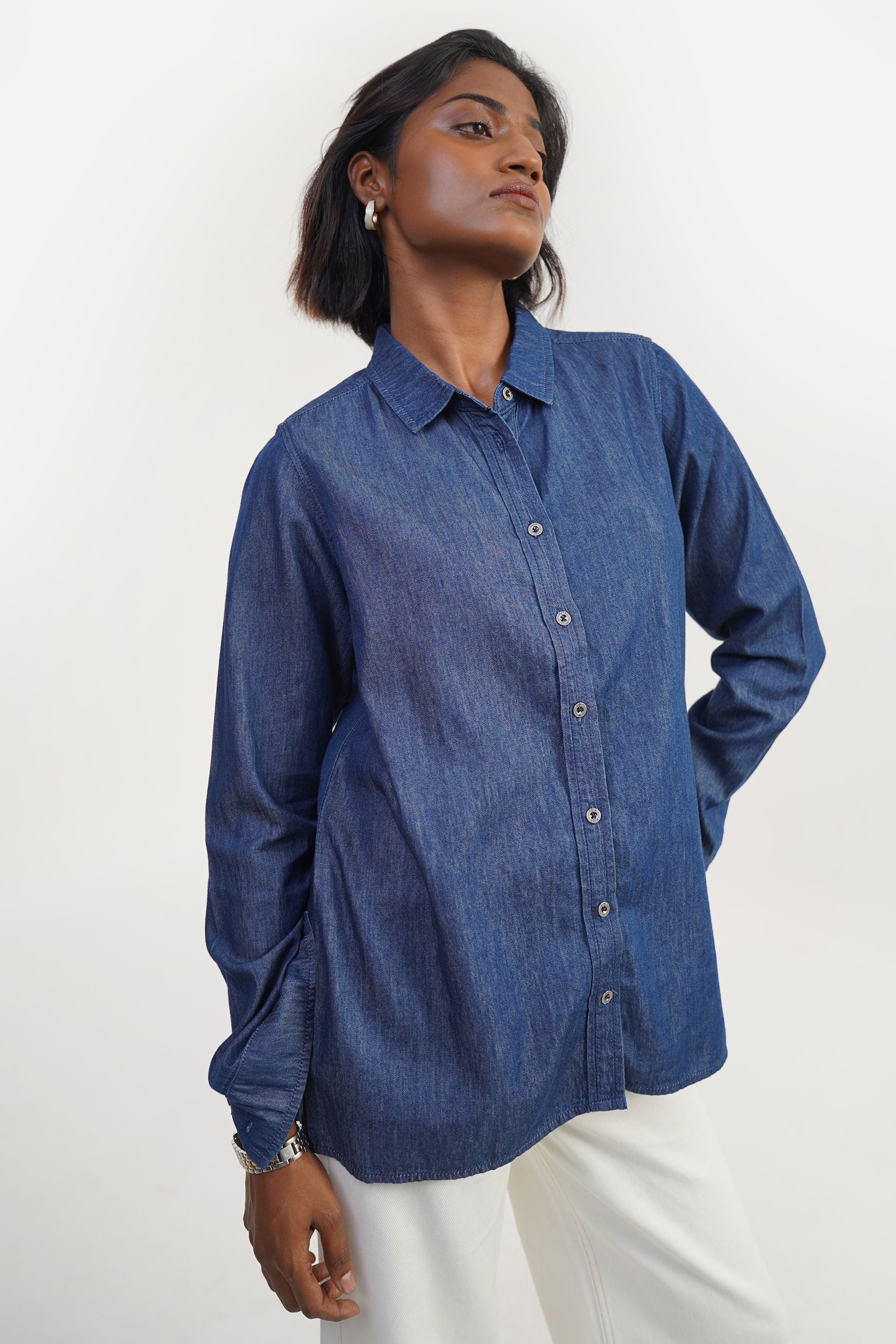 Dark blue pure cotton relaxed fit shirt from India with minimal look and front buttoned rinse wash finish