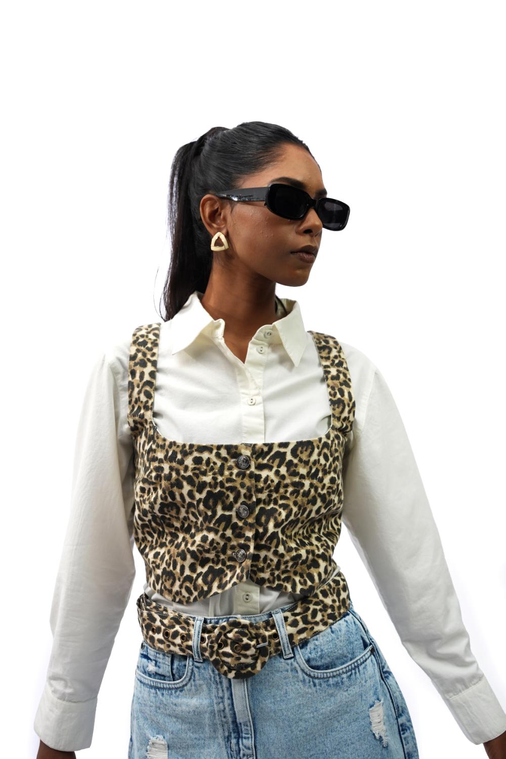 Urban Wild | White shirt with leapord print vest along with ripped skirt