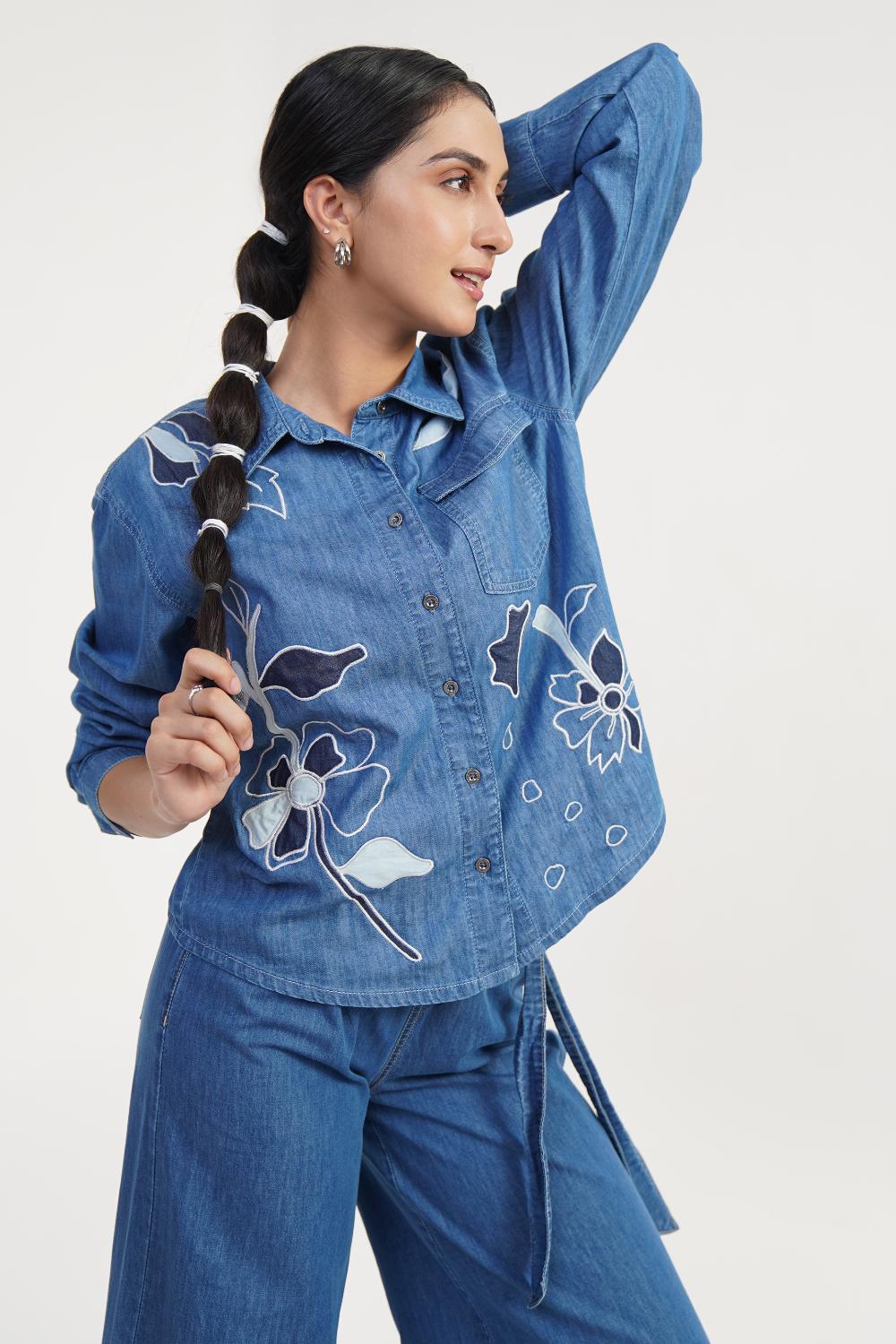 Stylish women's denim shirt, perfect jeans top for girls, featuring a cropped design and sleeveless style.